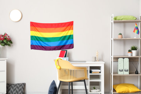 Interior of room with modern workplace and flag of LGBTの写真素材
