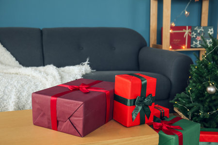 Christmas gifts on stand in living room, closeupの写真素材