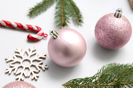 Beautiful Christmas decorations and fir branches on white background, closeupの写真素材
