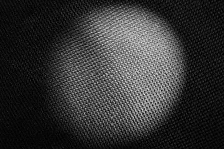 Black texture with backlight as background