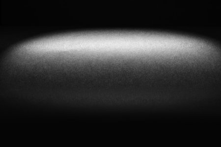 Backlit black surface as backgroundの写真素材