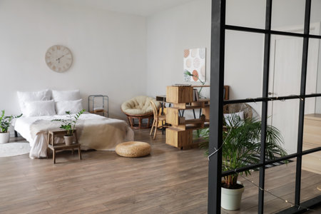 Interior of stylish room with comfortable bed