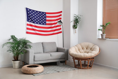 Interior of stylish living room with USA flagの写真素材