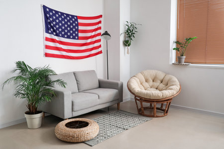 Interior of stylish living room with USA flagの写真素材