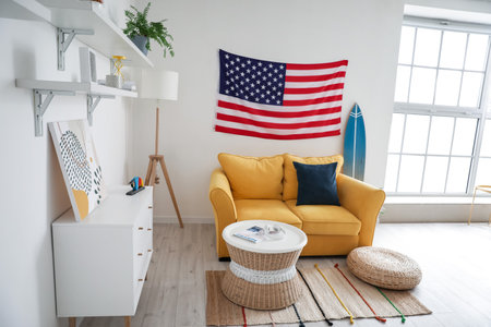 Interior of stylish living room with USA flagの写真素材