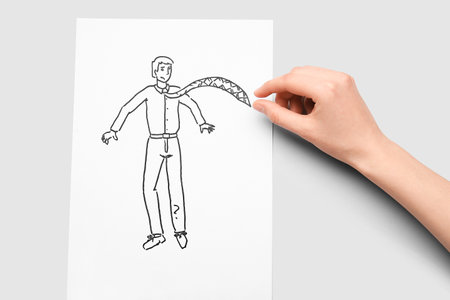Female hand and drawing of man on light background. concept of harassment