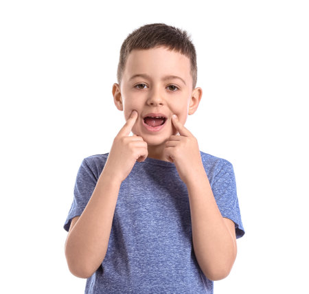Little boy training pronounce letters on white background