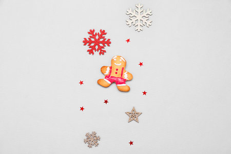 Composition with tasty Christmas cookies and decorations on gray backgroundの写真素材