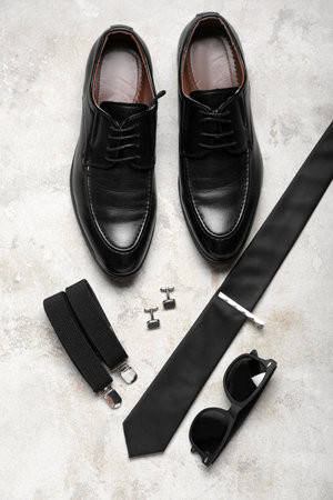 Male shoes and accessories on light backgroundの写真素材