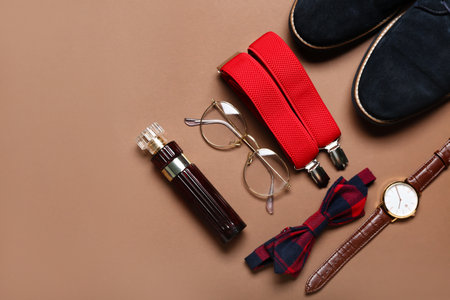 Stylish male accessories and shoes on brown backgroundの写真素材