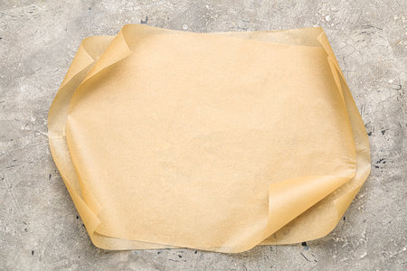 Sheets of baking paper on grunge backgroundの写真素材