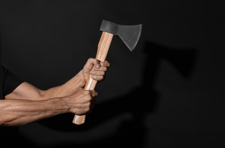 Man with ax on black backgroundの写真素材