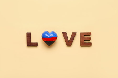 Word LOVE with heart on color background. Polyamory conceptの写真素材