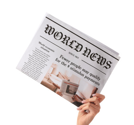 Female hand and newspaper on white backgroundの写真素材