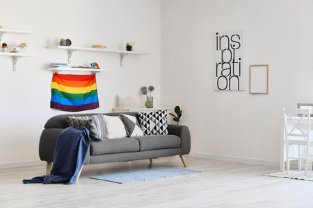 Sofa and flag of LGBT in interior of living roomの写真素材