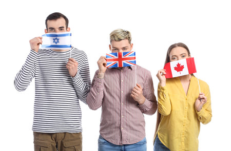 Young people with different flags on white backgroundの写真素材