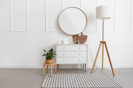 Interior of stylish living room with mirrorの写真素材