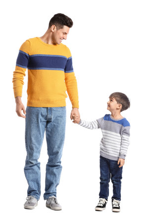 Happy father and his little son on white backgroundの写真素材
