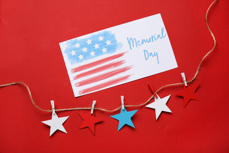 Greeting card for Memorial Day celebration on color background