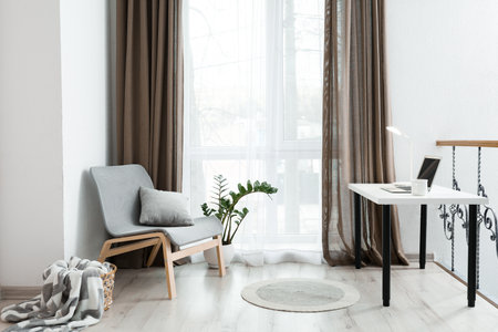 Interior of stylish room with modern workplaceの写真素材