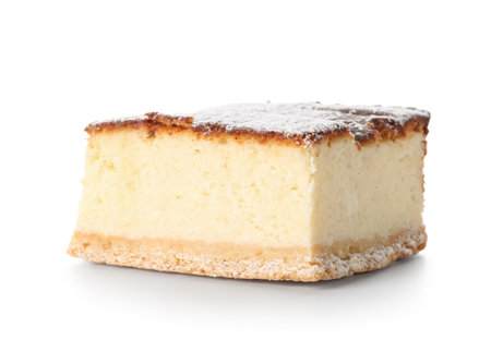 Piece of delicious cheese pie with sugar powder on white backgroundの写真素材
