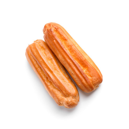 Delicious sweet eclairs isolated on white background