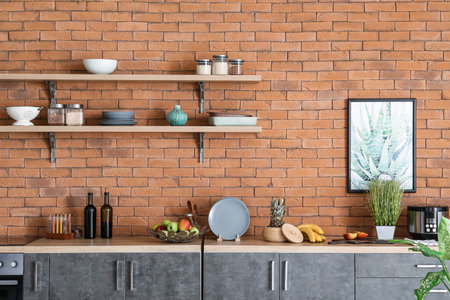 Interior of stylish kitchen with food and utensilsの写真素材