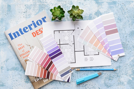 Composition with paint color samples and house plan on color background