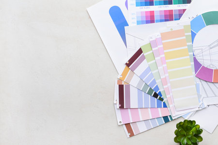 Paint color samples with houseplant on white backgroundの写真素材