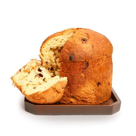 Board with cut Panettone on white backgroundの写真素材
