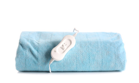Blue electric heating pad with controller on white backgroundの写真素材