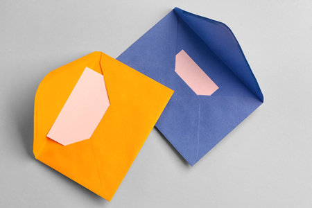 Envelopes with cards on gray backgroundの写真素材