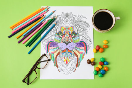 Composition with coloring picture on tableの写真素材