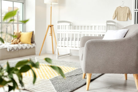 Interior of stylish children's room with comfortable bedの写真素材