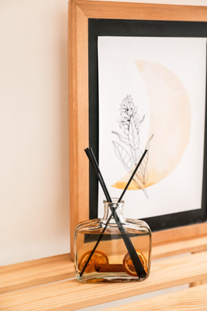 Aroma reed diffuser on shelf in room