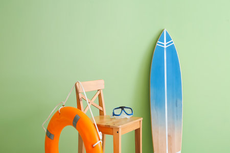 Interior of modern room with surfboard and lifebuoyの写真素材