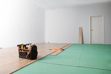 Carpenter tools on new laminate floorの写真素材