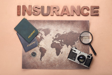 Composition with word INSURANCE and map on color backgroundの写真素材
