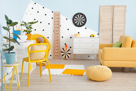 Stylish interior of modern children's room with wooden stadiometerの写真素材