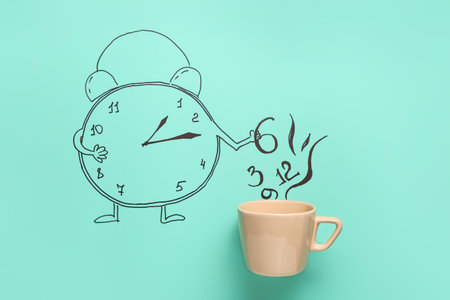 Creative composition with drawn alarm clock and cup on color backgroundの写真素材