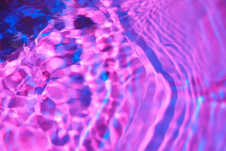 Texture of clean water on color backgroundの写真素材