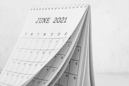Flip paper calendar on light background, closeupの写真素材