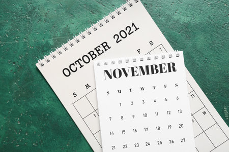 Flip paper calendars on color backgroundの写真素材