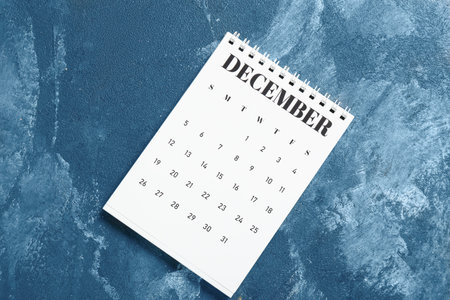 Flip paper calendar on color backgroundの写真素材