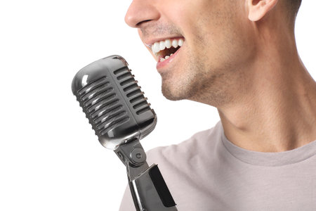 Handsome man singing on white backgroundの写真素材