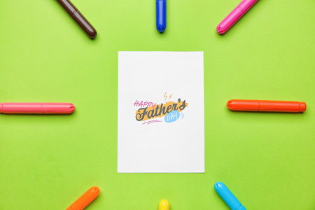 Greeting card for Father's Day celebration on color backgroundの写真素材