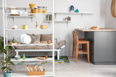 Interior of modern kitchen with shelf unitの写真素材