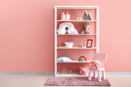 Shelf with toys and decor in children's roomの写真素材