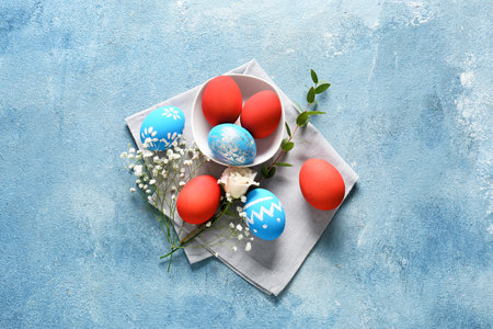 Composition with beautiful Easter eggs on color background