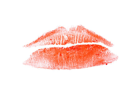 Orange lipstick kiss mark on white background